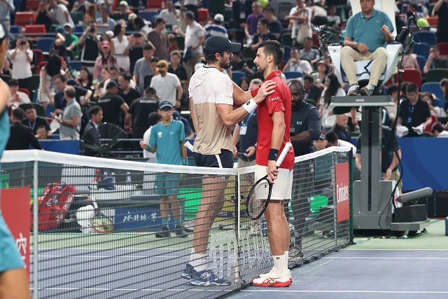 对手说出了观众的心声：不要退役    摄影/任玉明